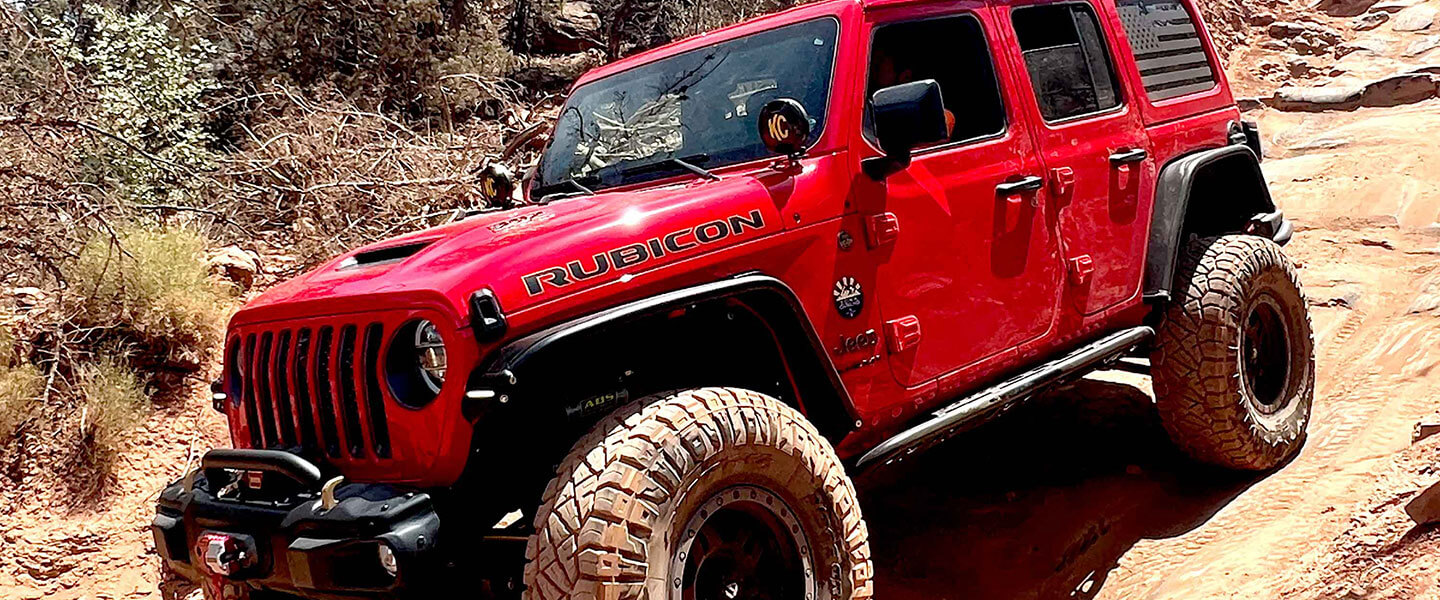 Red Jeep with KC Lights