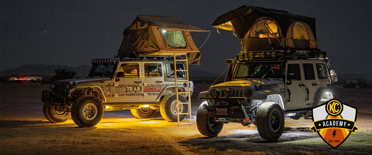 Jeeps with rock lights and roof mounted tents